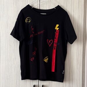 Stylish Black Graphic Tee with Colorful Accents